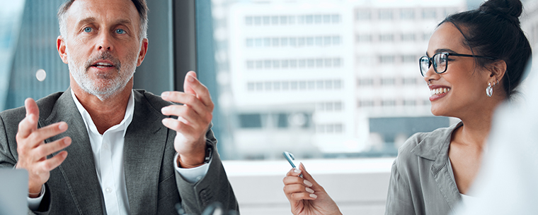 Woman and man in business meeting